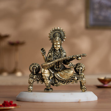 Brass Saraswati Idol Playing Veena On Singhasan (4 Inch)