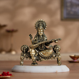 Brass Saraswati Idol Playing Veena On Singhasan (4 Inch)