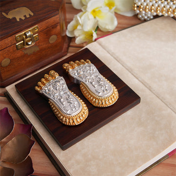 Maa Lakshmi's Charan Paduka on Elegant Base - Gold & Silver Plated