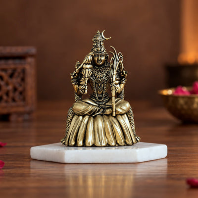 Brass Rajarajeshwari Lalitha Devi idol seated with parrot and sugarcane bow, on a white marble base