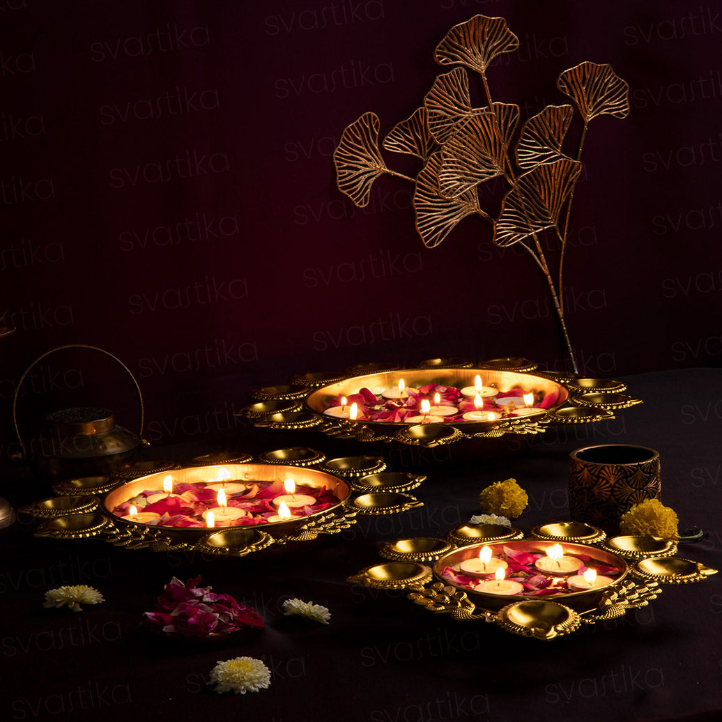 Brass urli with floating diya for decor