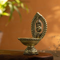 brass diya