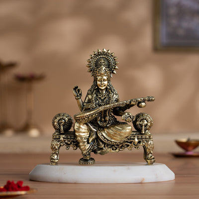 Brass Saraswati Idol Playing Veena On Singhasan (4 Inch)