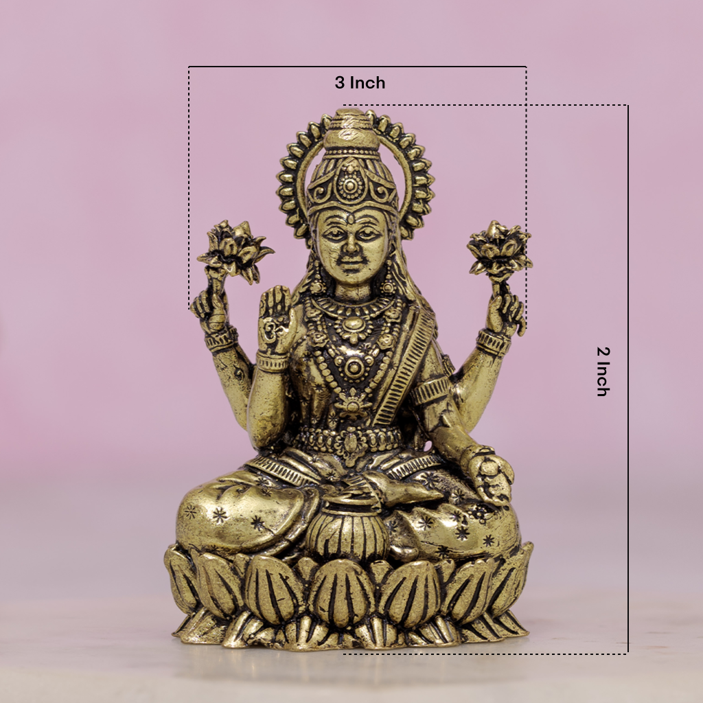 brass sitting lakshmi idol