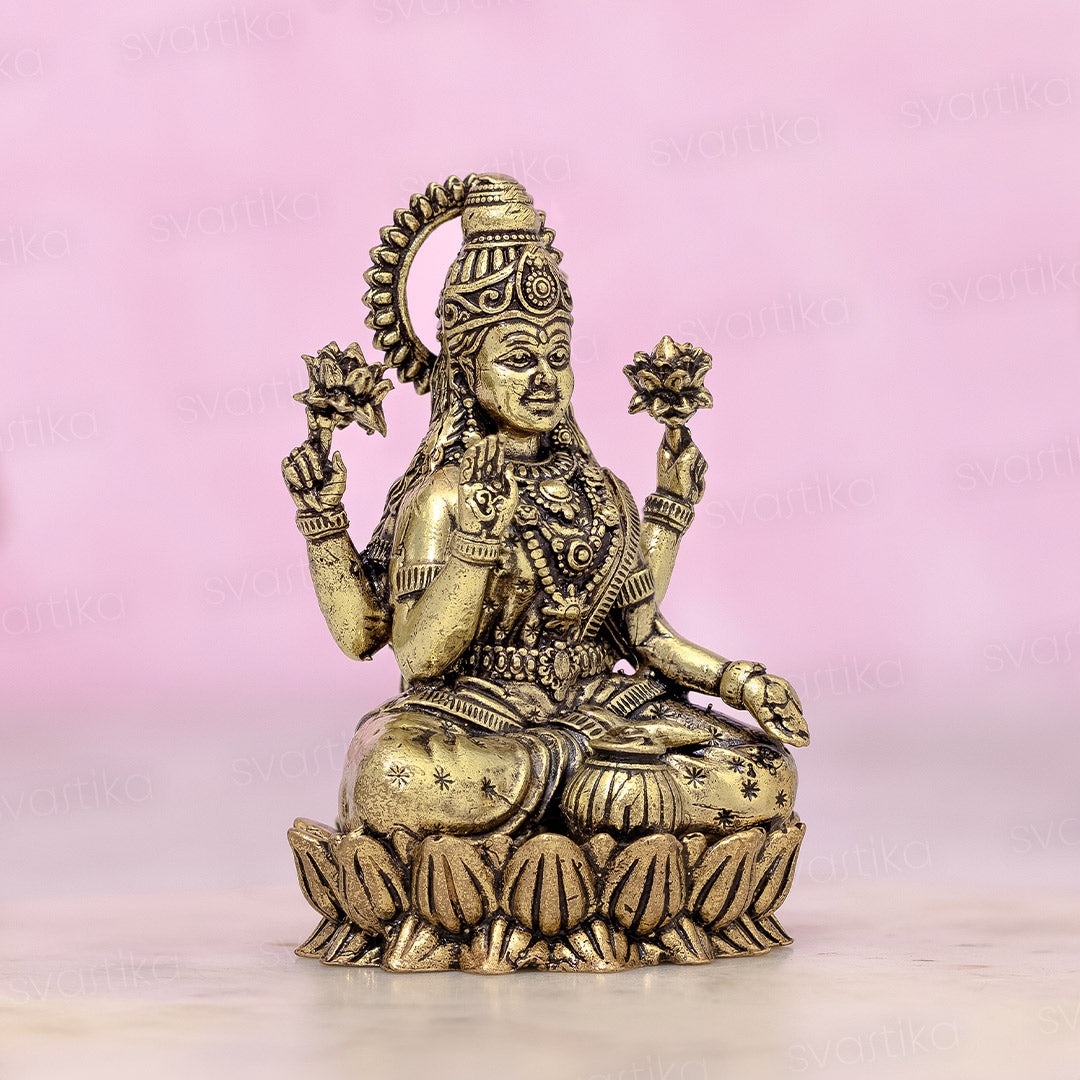 sitting brass lakshmi statue