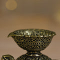 brass diya