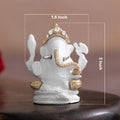 white ganesh idol for car dashboard