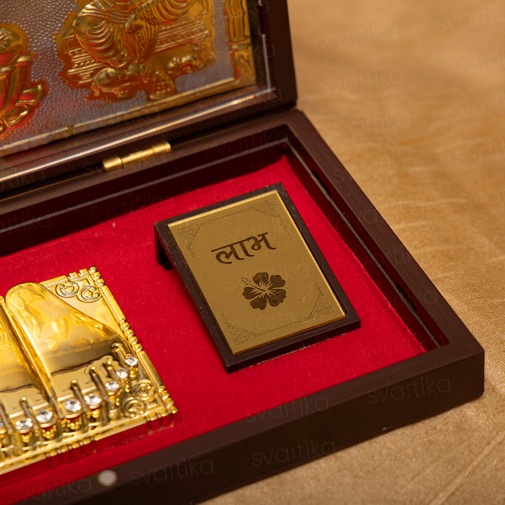 gold plated lakshmi ganesh saraswati prayer box for pooja 