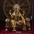 brass lakshmi on throne