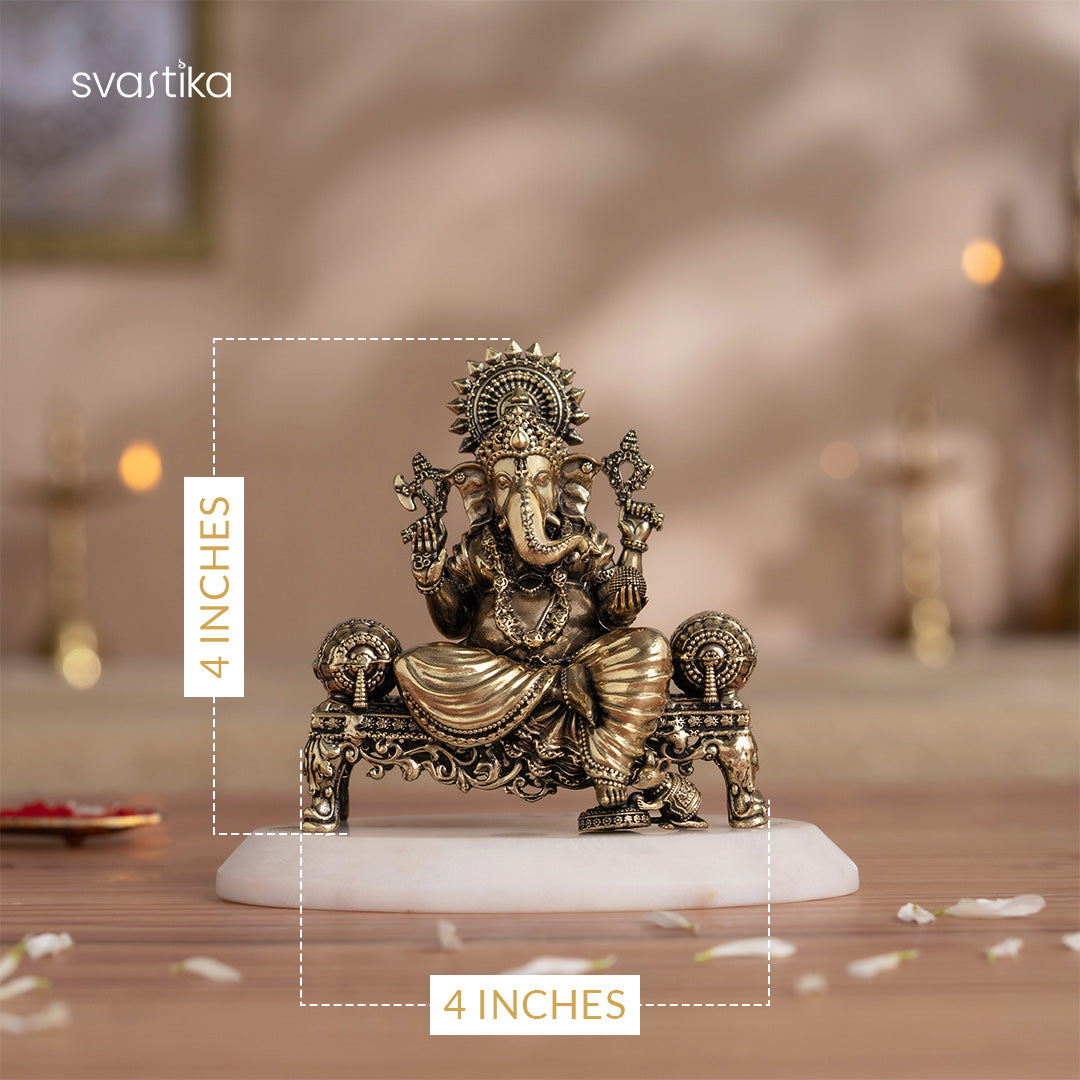 ganesh idol sitting on sinhasan brass idol