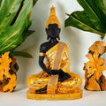 black big meditating buddha statue