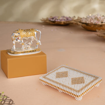 Kamdhenu Cow with Calf Idol - Gold & Silver Plated (5 Inch) with White & Gold Pearl Pooja Chowki (9 inch) - Combo
