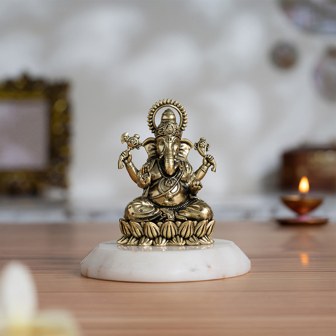 Brass Left-Trunk Ganesha Murti Sitting On Lotus (3 Inch)