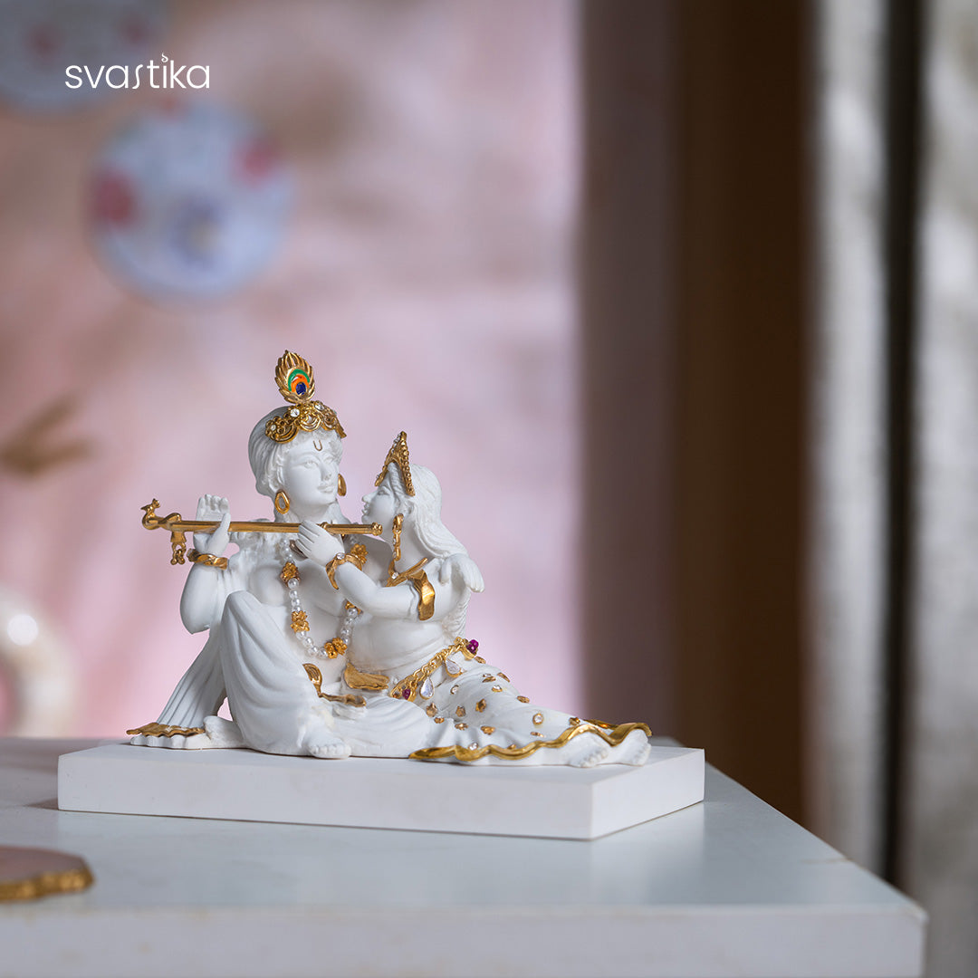 Sitting Radha Krishna idol