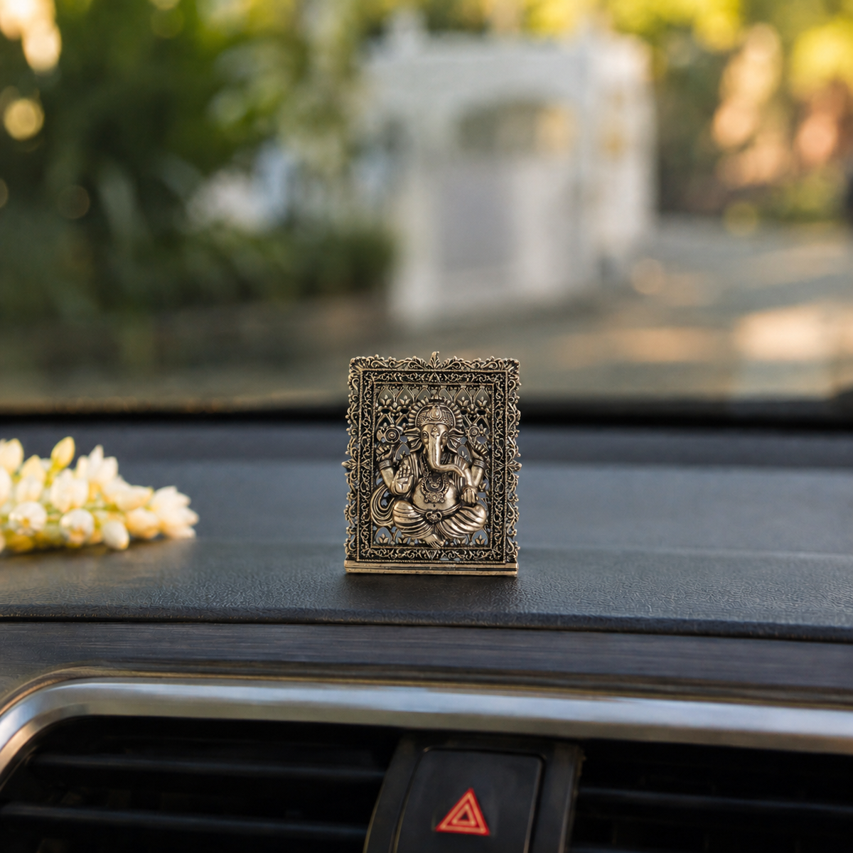 Brass framed Ganesh idol for car dashboard
