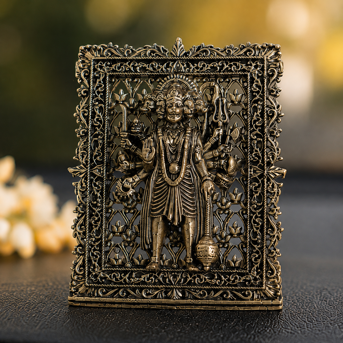 Brass framed standing Panchmukhi Hanuman idol for car dashboard, close view