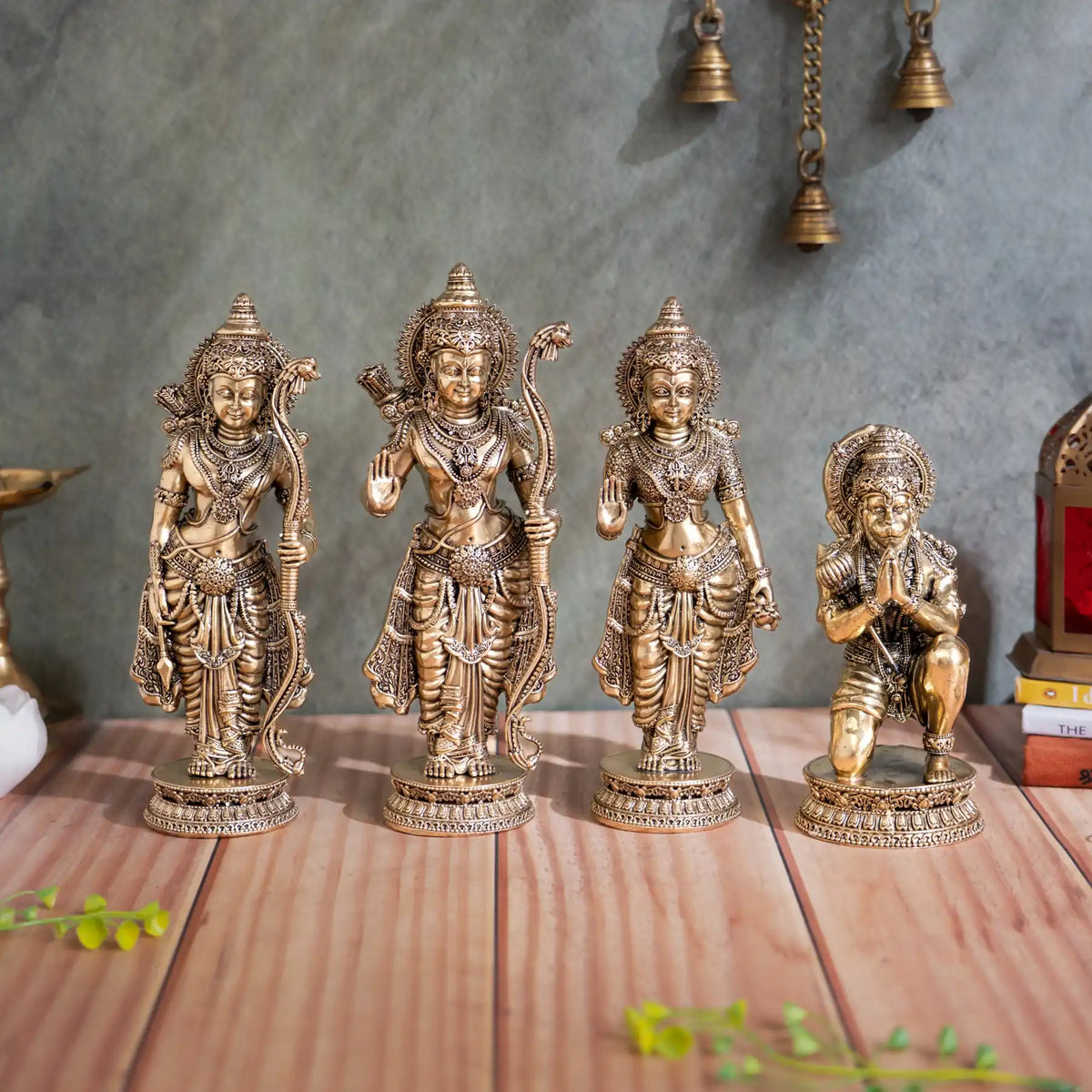 Front view of brass Ram Darbar set with standing Ram, Sita and Lakshman beside kneeling Hanuman with folded hands