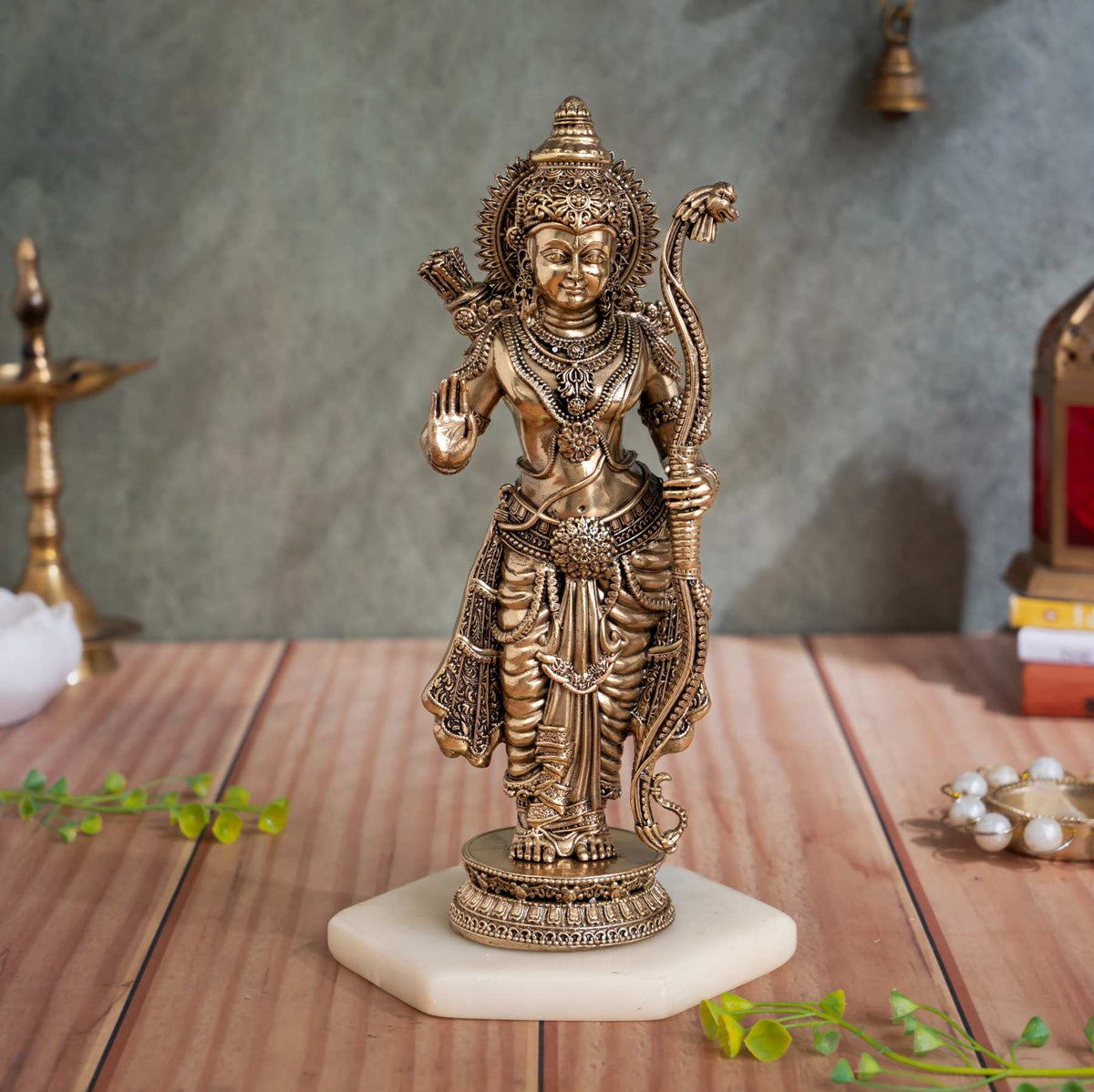 Brass standing Lord Ram idol holding a bow with his right hand raised in blessing, front view