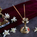 gold plated floral design agarbatti