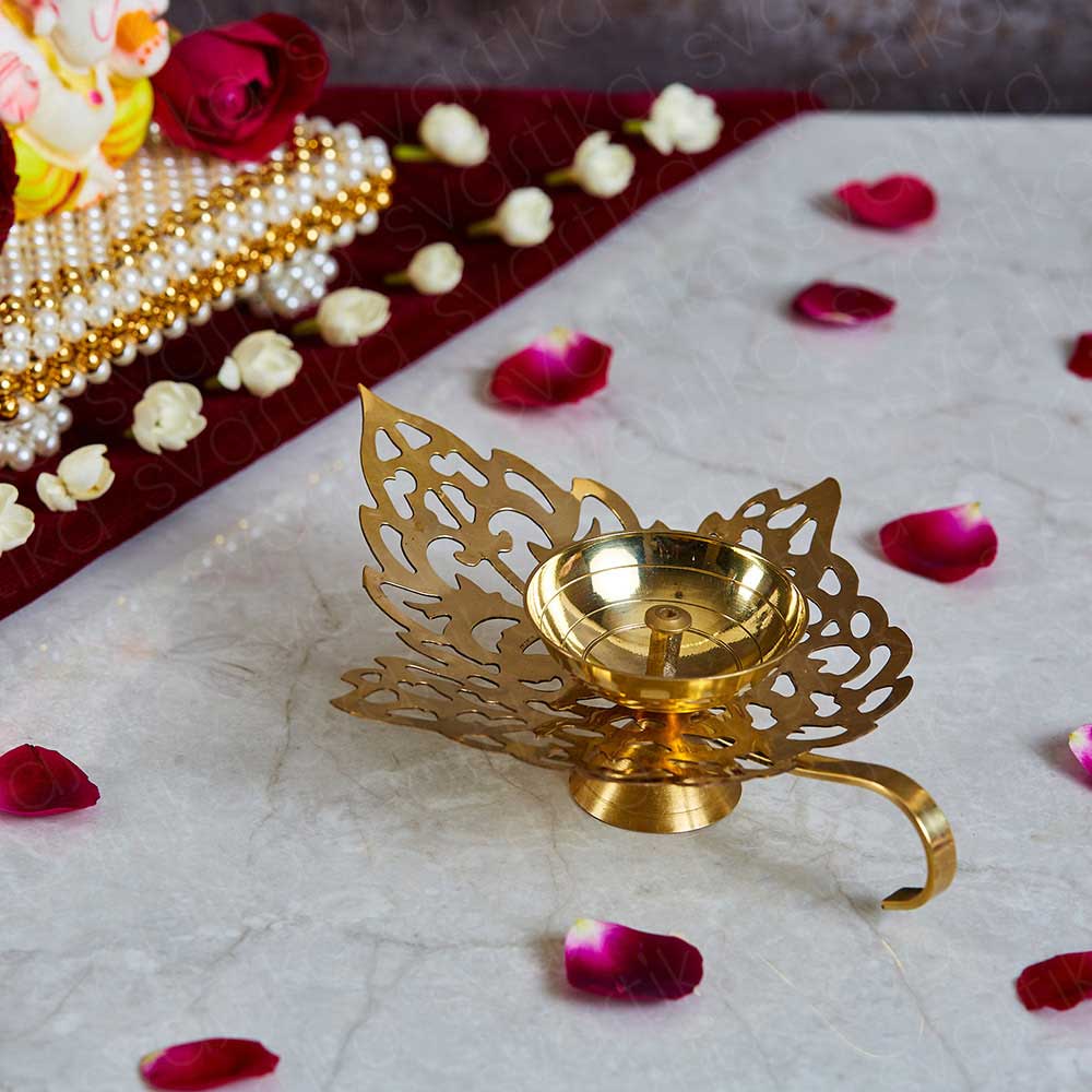 Leaf-shaped Brass Pooja Diya with Graceful Handle