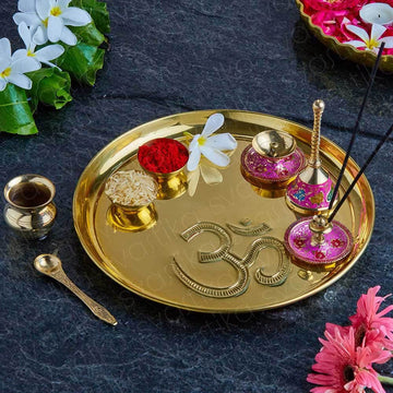 om carved gold plated thali set
