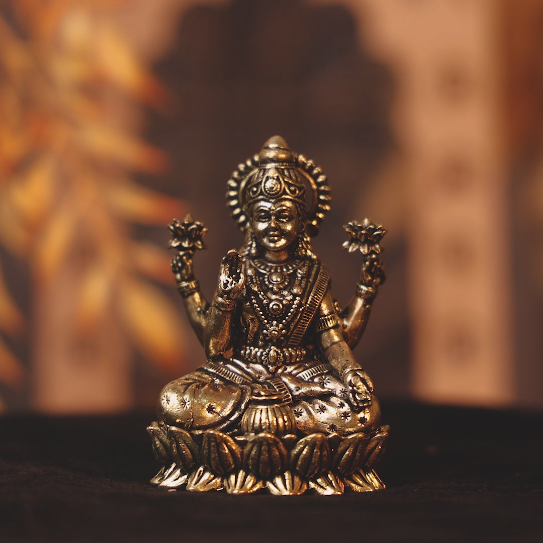 brass sitting lakshmi idol