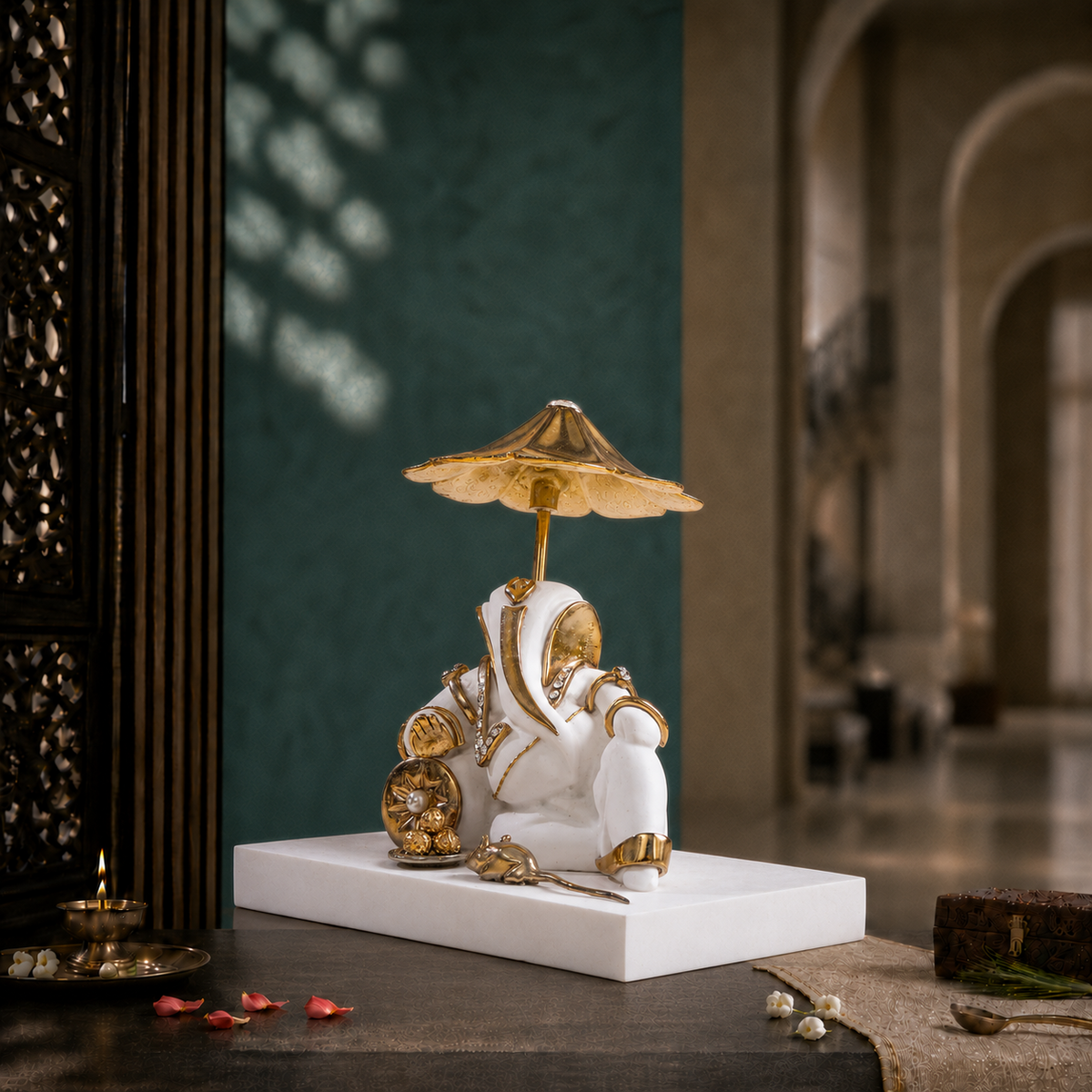 Svastika resting Ganesh idol with umbrella, white and gold 4 inch left-angle view