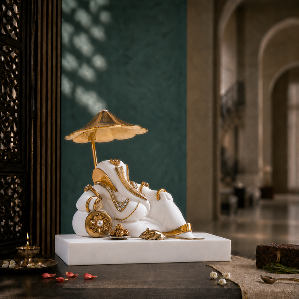 Svastika resting Ganesh idol with umbrella for car dashboard, white and gold 4 inch right-angle view
