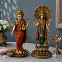 Lord Vishnu and Maa Lakshmi standing antique idol pair close-up hero image